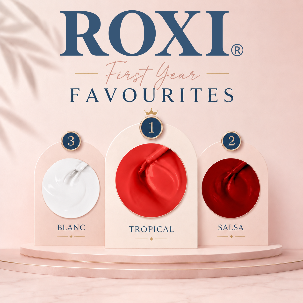 ROXI First Year Favourites set with three nail products on a pink background