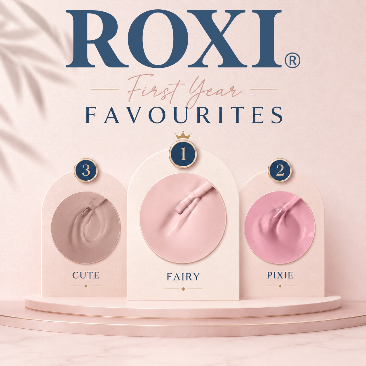 ROXI First Year Favourites product display with three pink items labeled 'Cute', 'Fairy', and 'Pixie' on a light pink background.